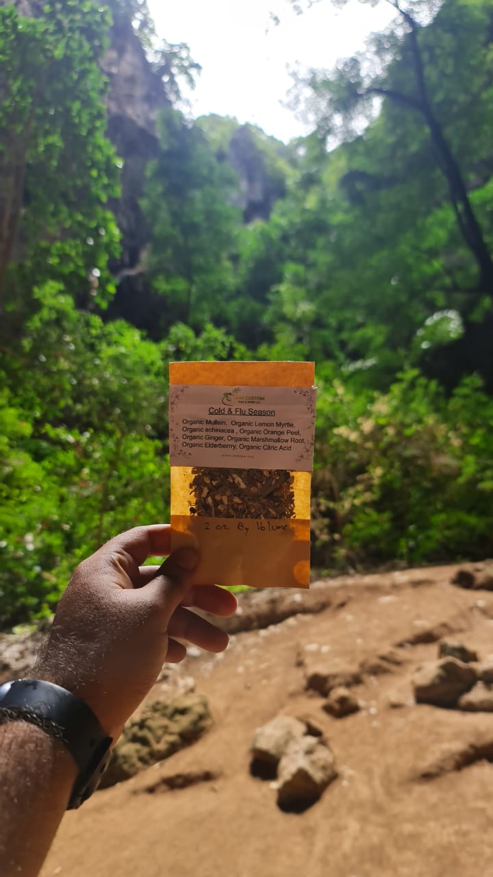 hand holding a tea package